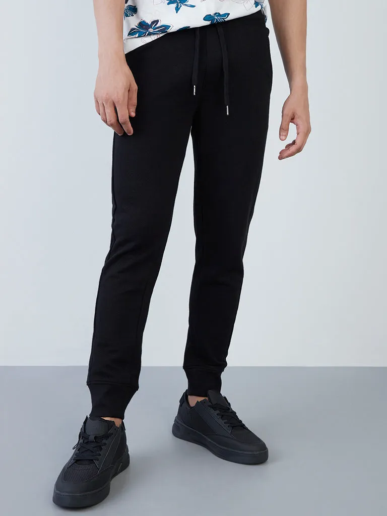 ETA Black Self-Textured Cotton-Blend Slim-Fit Mid-Rise Joggers